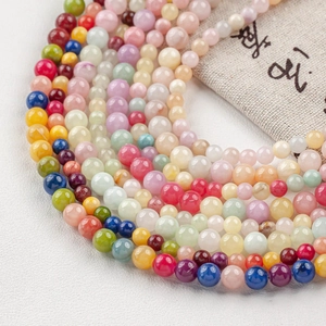 Polished natural jade beads in vibrant colors for DIY jewelry making and necklaces