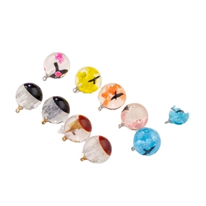 DIY glowing resin ball pendants with eagle silhouettes for handmade jewelry making