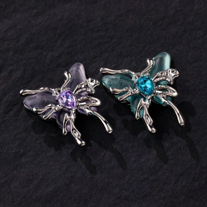Liquid alloy butterfly pendants in purple and teal with gradient wings for DIY jewelry