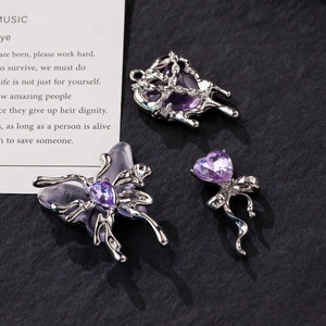 Dark aesthetic liquid alloy butterfly and heart pendants with purple crystals