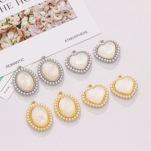 Elegant opal heart and oval charms with pearl edges for DIY jewelry making