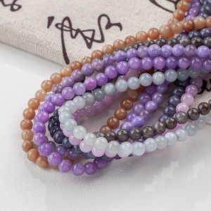 Multi-layer natural stone bead bracelets set in purple, amber, and light blue tones