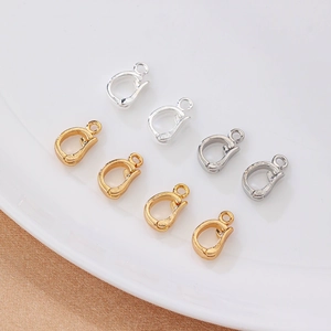 Detailed view of copper gold-plated jewelry clasps in silver, gold and rose gold finishes