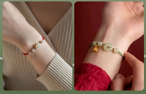 Detail of handmade Chinese style woven bracelets with green jade beads and charms