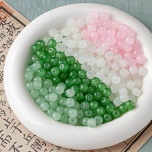 Polished faux jade abacus beads in green, white, and pink for DIY jewelry making
