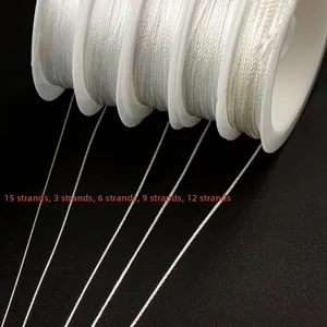 Macro view of white polyester pearl beading threads in 3 to 15 strands thickness
