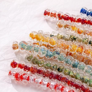 Close-up of 12mm ripple glass beads in vibrant colors for DIY jewelry making