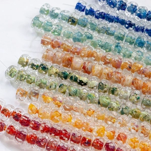 Detail of 12mm water-ripple glass lampwork beads for DIY jewelry making and crafts