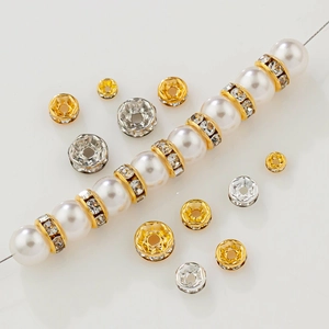Detalle de cuentas espaciadoras en oro 18K y plata con circonitas para creación de joyas
