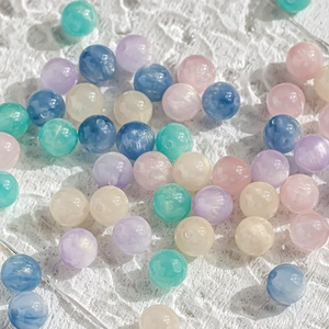 Pastel cat-eye beads with marble texture and gold foil for DIY jewelry making