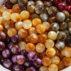 Macro view of 10mm colorful translucent resin beads for DIY jewelry making and crafts