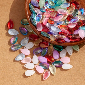 Macro shot of gradient crystal water drop petals for DIY jewelry with aurora coating