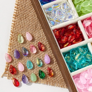 Gradient teardrop glass petals for DIY hairpins and jewelry making in wooden tray