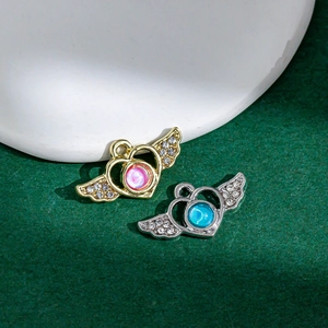 Ciondoli a cuore con ali e strass in oro e argento per la creazione di gioielli fai-da-te