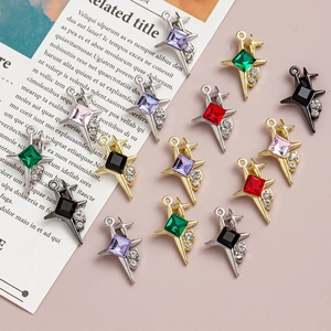 Macro shot of colorful star-shaped alloy pendants with rhinestones for DIY jewelry making
