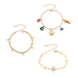 Armband-Set aus goldenem Edelstahl mit Meeresanhängern, Sternen und Zirkonia