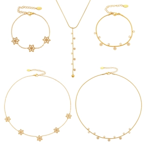 5-piece gold stainless steel jewelry set featuring plum blossom pendants and cubic zirconia