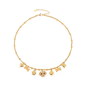 Gold stainless steel dog pendant necklace with pavé zircon charms and bone accents