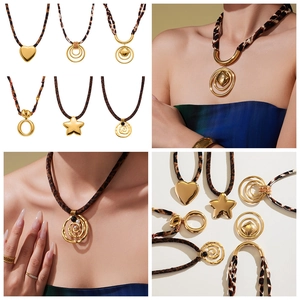 Collage of heart and geometric gold pendants with leopard print silk scarf necklace cord