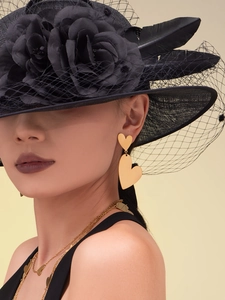 Detail of 18k gold plated double heart earrings and layered choker set on model