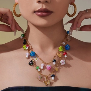 Chic layered necklace with butterfly zircon pendants, strawberry and floral resin charms