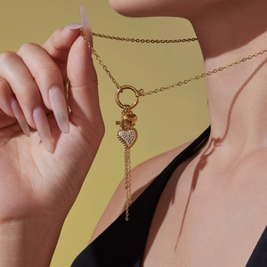 Luxuriöse goldene Herzschlüssel Kette mit Zirkonia-Anhängern und eleganten Quasten