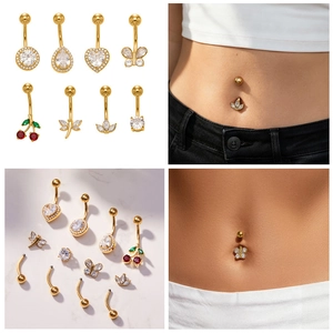 Set of 18k gold plated belly rings with various charms like hearts, butterflies and cherries
