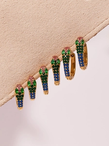 Detail of 18k gold plated snake hoop earrings with colorful gradient zircon inlay