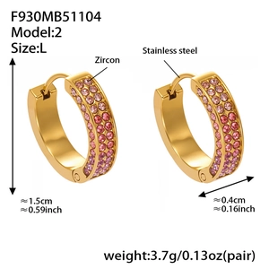Macro detail of gold U-shaped hoop earrings with pink zircon dimensions and weight