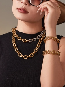 Ensemble collier et bracelet à grosse maille gourmette bicolore or et argent