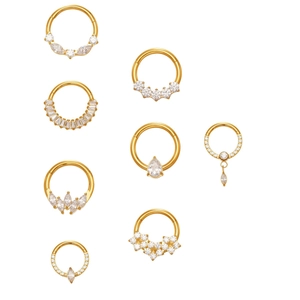 Gold titanium nose rings set with 5A zircons in pear, round, and marquise cuts