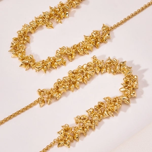 Elegant 18k gold plated stainless steel necklace featuring multiple heart pendants