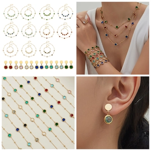 Detailed set of 18k gold plated stainless steel jewelry with colorful faceted glass stones
