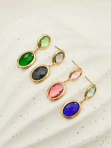 Detail of 18k gold plated geometric oval earrings with multi-color faceted glass stones