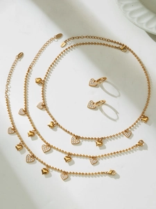 Detailed view of 18k gold plated stainless steel heart jewelry set with cubic zirconia