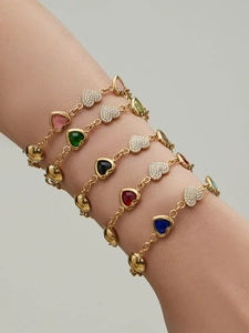 Close-up of heart link bracelets with colorful resin and 5A zircon in 18k gold plating