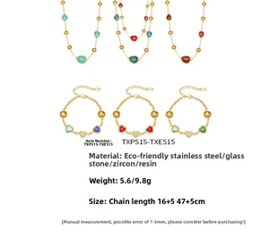 Detail of 18k gold plated stainless steel jewelry set with colorful resin and zircon hearts