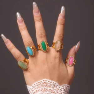 Five-piece gold-plated ring set with oval colorful gemstones and sparkling zircons