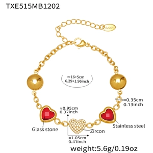 Detail of stainless steel bracelet with red glass hearts and zircon heart pendant