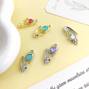 DIY Tulip charms with heart-shaped gradient gems in gold and silver metal frames