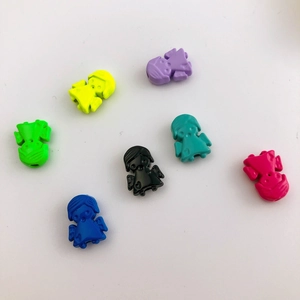 Detailed view of colorful alloy girl charms for DIY handmade bracelet and necklace making
