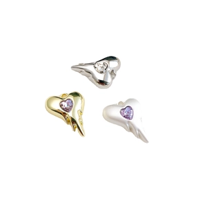 Lava heart charms with zirconia stones in silver and gold finishes for DIY jewelry