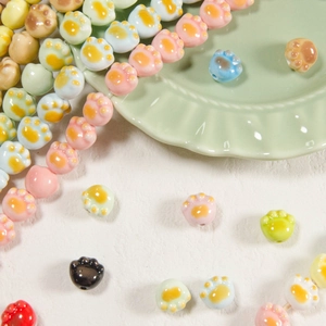 Colorful ceramic cat paw beads for DIY necklace making in various pastel macaron colors