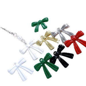 Colgantes de lazo coloridos de aleación para creación de joyas DIY en varios colores