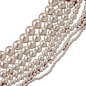 Multiple sizes of white round faux pearls with glossy finish for DIY jewelry crafts