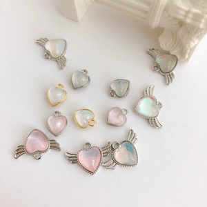 Charming heart wing pendants with moonstone resin in multiple colors for DIY jewelry making