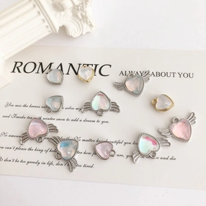 Alloy heart and angel wing pendants with moonstone resin insets for DIY jewelry making