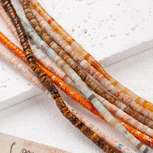 Macro shot of 4x2mm sunset orange natural stone heishi beads for DIY jewelry making