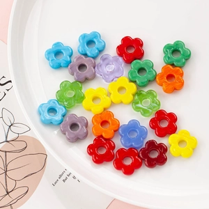 Macro shot of 16mm colorful hollow flower glass beads for DIY jewelry making