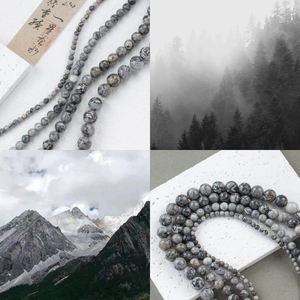 Macro detail of gray marble natural stone beads with ink texture for DIY jewelry making